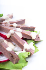 Fresh salad with veal tongue