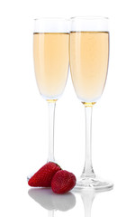 glasses of champagne and strawberries isolated on a white