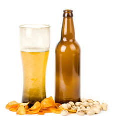 Beer bottle and potato chips, pistachios isolated on a white