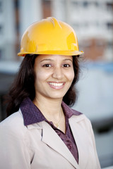 Happy female construction engineer