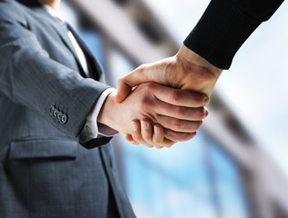 Two businessmen shaking hands.