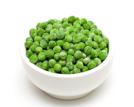 frozen peas isolated on white background