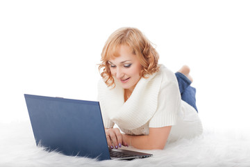 Naklejka premium Young woman with a laptop.