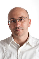 Obraz premium Bald man with glasses portrait. White background.