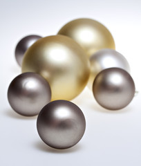 Glass baubles on white.