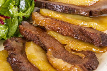 duck fillet, mashed potatoes seasoned with truffle oil, fig and