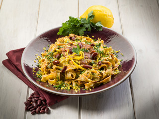 pasta with beans sauce grated lemon peel and parsley, vegetarian