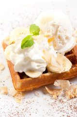Waffles with ice cream with banana split