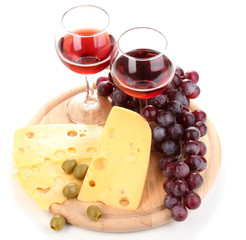 Wine in wineglasses and cheese isolated on white
