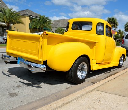 Bright Yellow Classic Pickup Truck