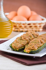 Stuffed zucchini halves.