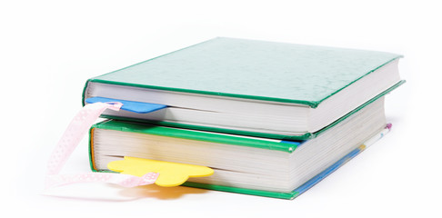 A stack of books on a white background.