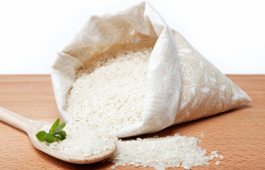 Rice on a wooden table.