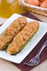 Stuffed zucchini halves.