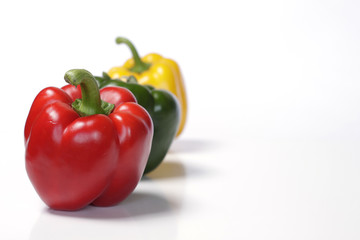 Fresh colorful paprika on white