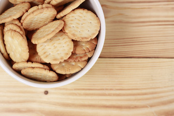 Cracker in a green bowl