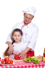 Father and daughter cooking together