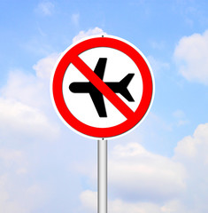 'no flying' sign on blue sky