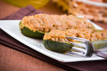 Stuffed zucchini halves.