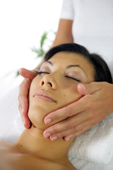 Naklejka premium Woman receiving face massage