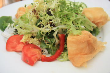 salad with fried goat cheese and tomato