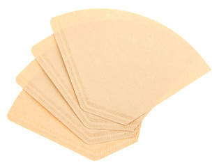 Four coffee filters isolated on a white background