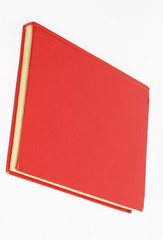 Red book on white background