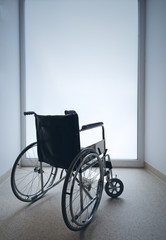 Fototapeta na wymiar Empty wheelchair