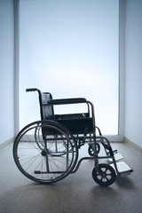 Fototapeta na wymiar Empty wheelchair