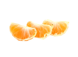 Slices of peeled orange on white background