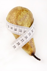 pear with a measuring tape
