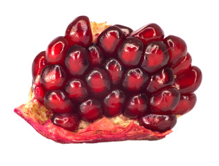 Extreme close up background of a red juicy ripe pomegranate frui