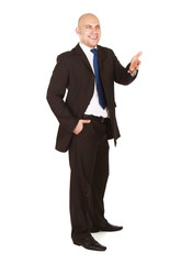 A full-length ortrait of a successful businessman