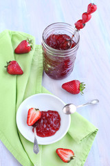 Strawberry jam and fresh strawberries