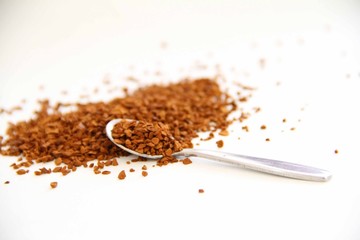Spilled Instant Coffee Granules and Spoon