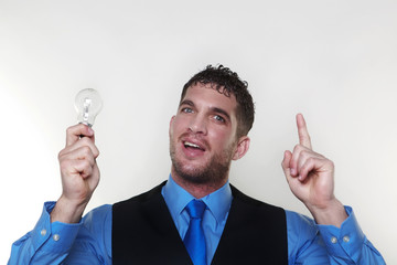 businessman wearing a shirt and tie in a waist coat