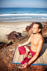 Yoga meditation on the cliff