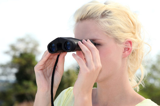 Young Woman With Binoculars