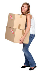 Woman carrying boxes