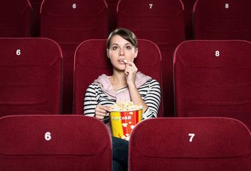 A girl at the cinema © Karramba Production