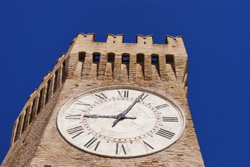Fototapeta na wymiar Tower of Gualtieri, big clock