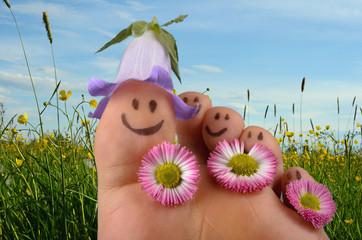 Happy foot on spring meadow
