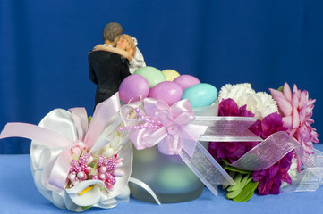 Arrangement with flowers and candy boxes