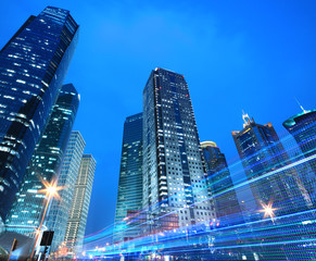Modern office building rainbow ray background night
