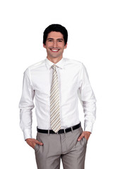 Confident businessman with hands in pockets