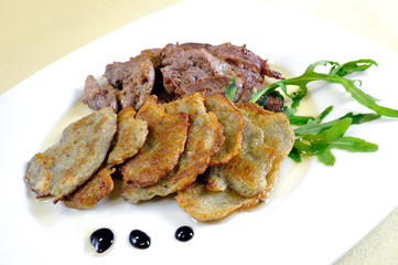 Lamb medallions with homemade potato pancakes, Czech cuisine