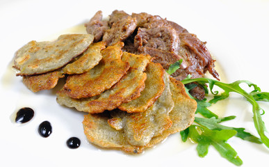 Lamb medallions with homemade potato pancakes, Czech cuisine