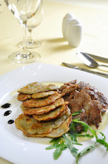 Lamb medallions with homemade potato pancakes, Czech cuisine