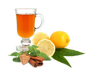 Tea with lemon, sugar, cinnamon and mint