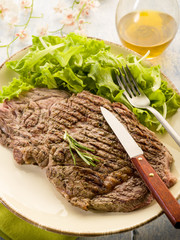 grilled t-bone with green salad